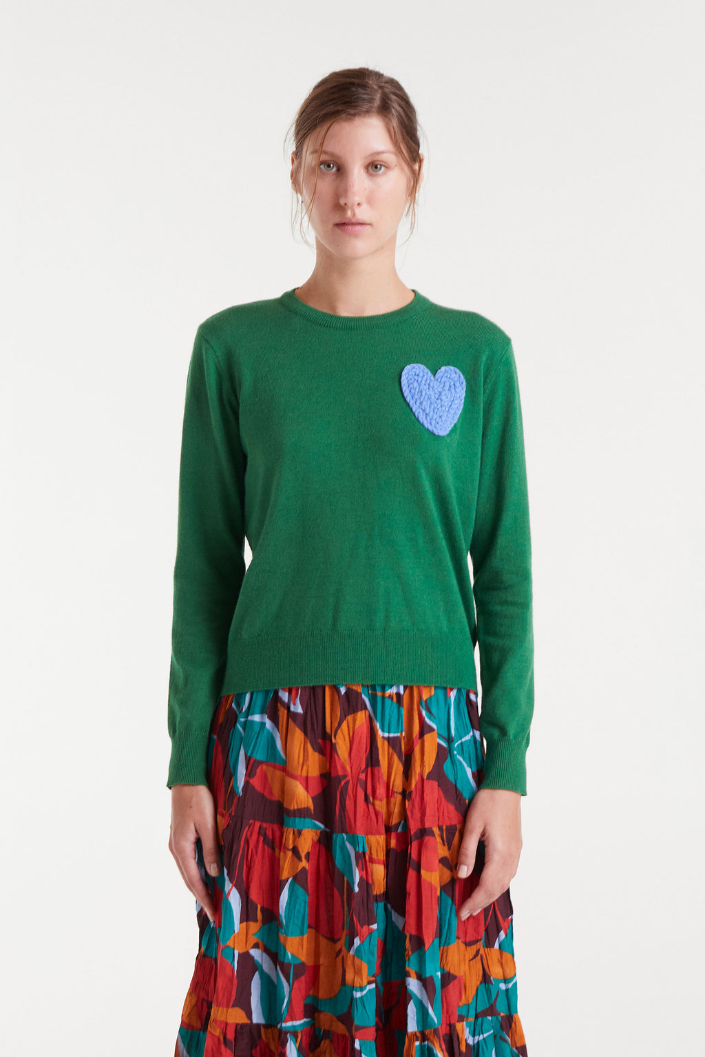 Green Jumper with Blue Heart.