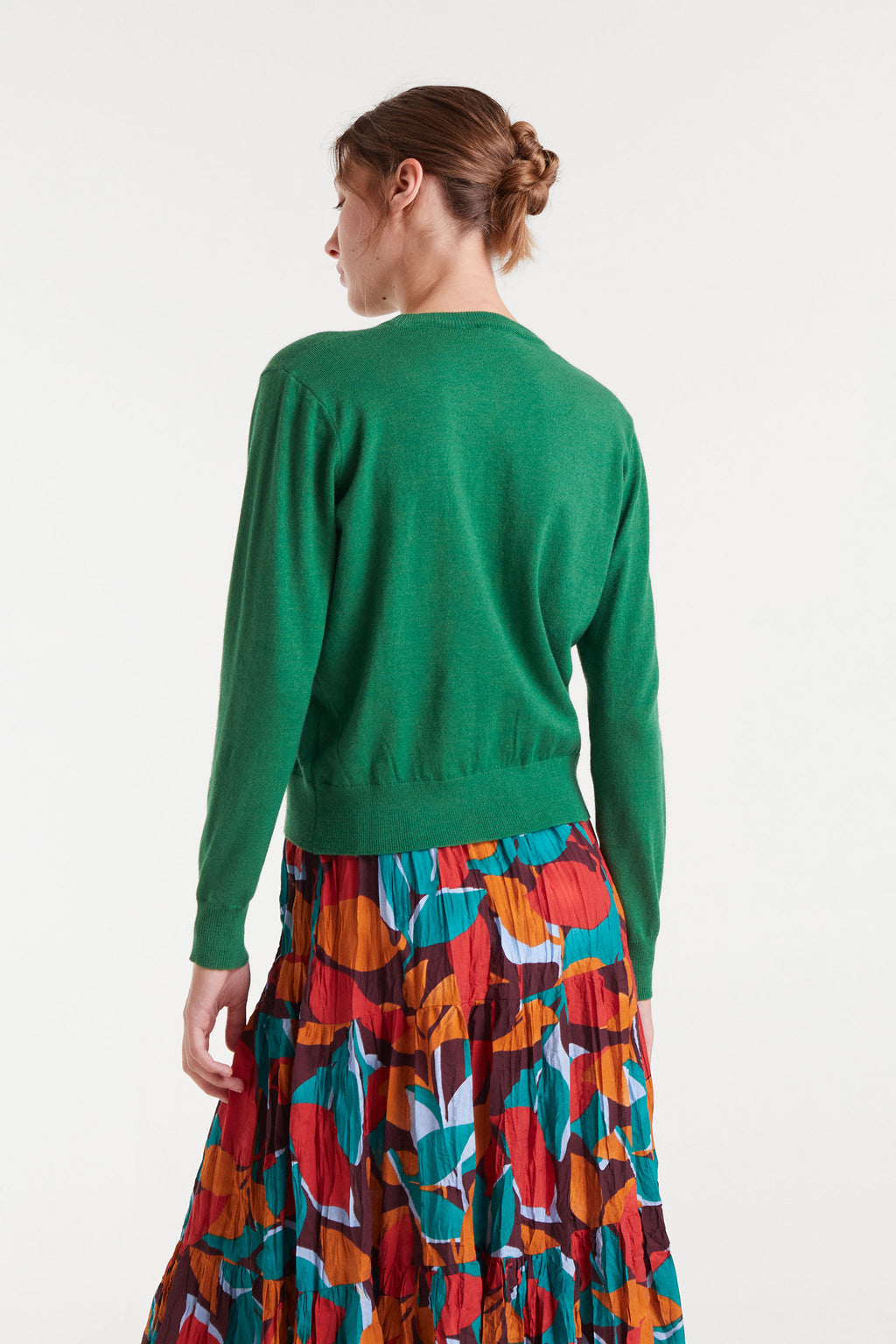 Green Jumper with Blue Heart.