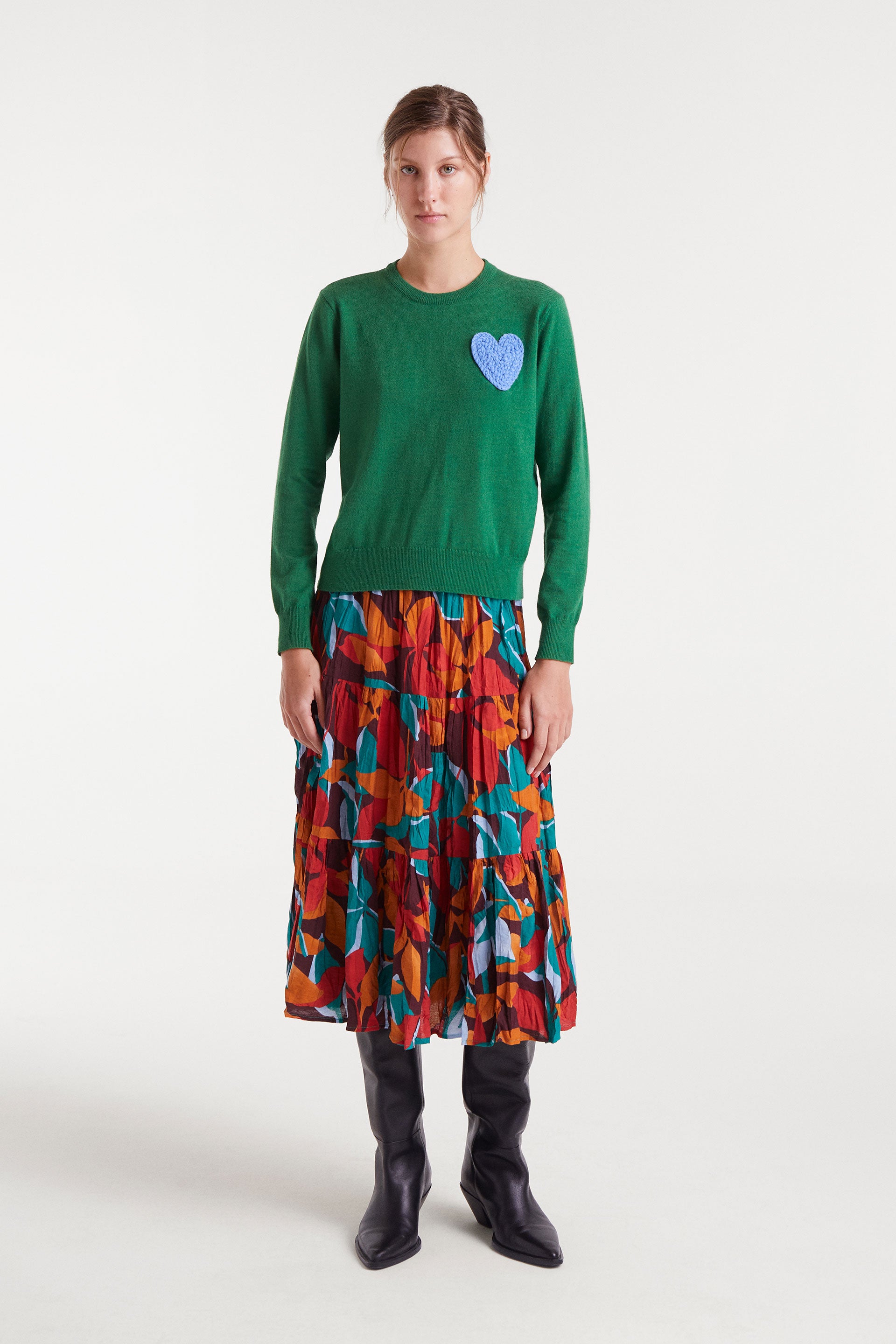 Green Jumper with Blue Heart.