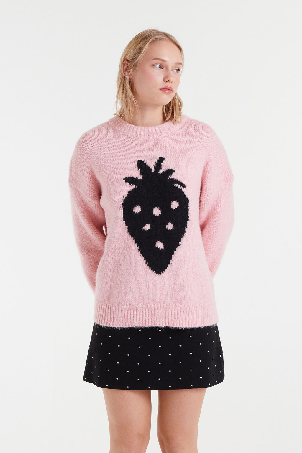 Pink Sweater with Black Strawbery Motif.