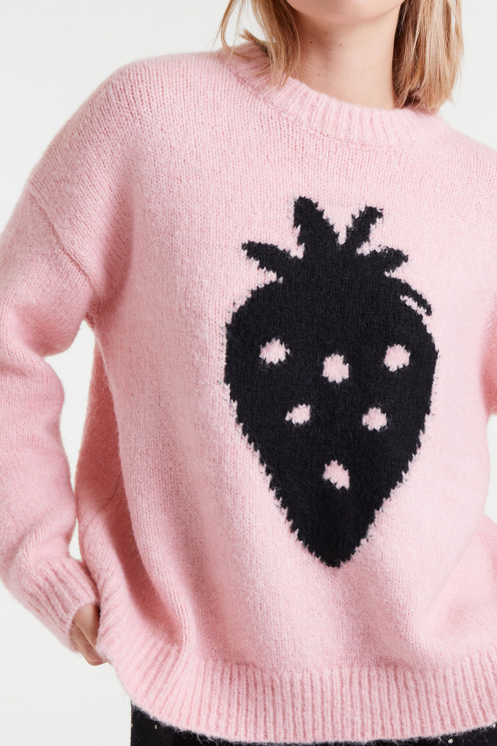 Pink Sweater with Black Strawbery Motif.