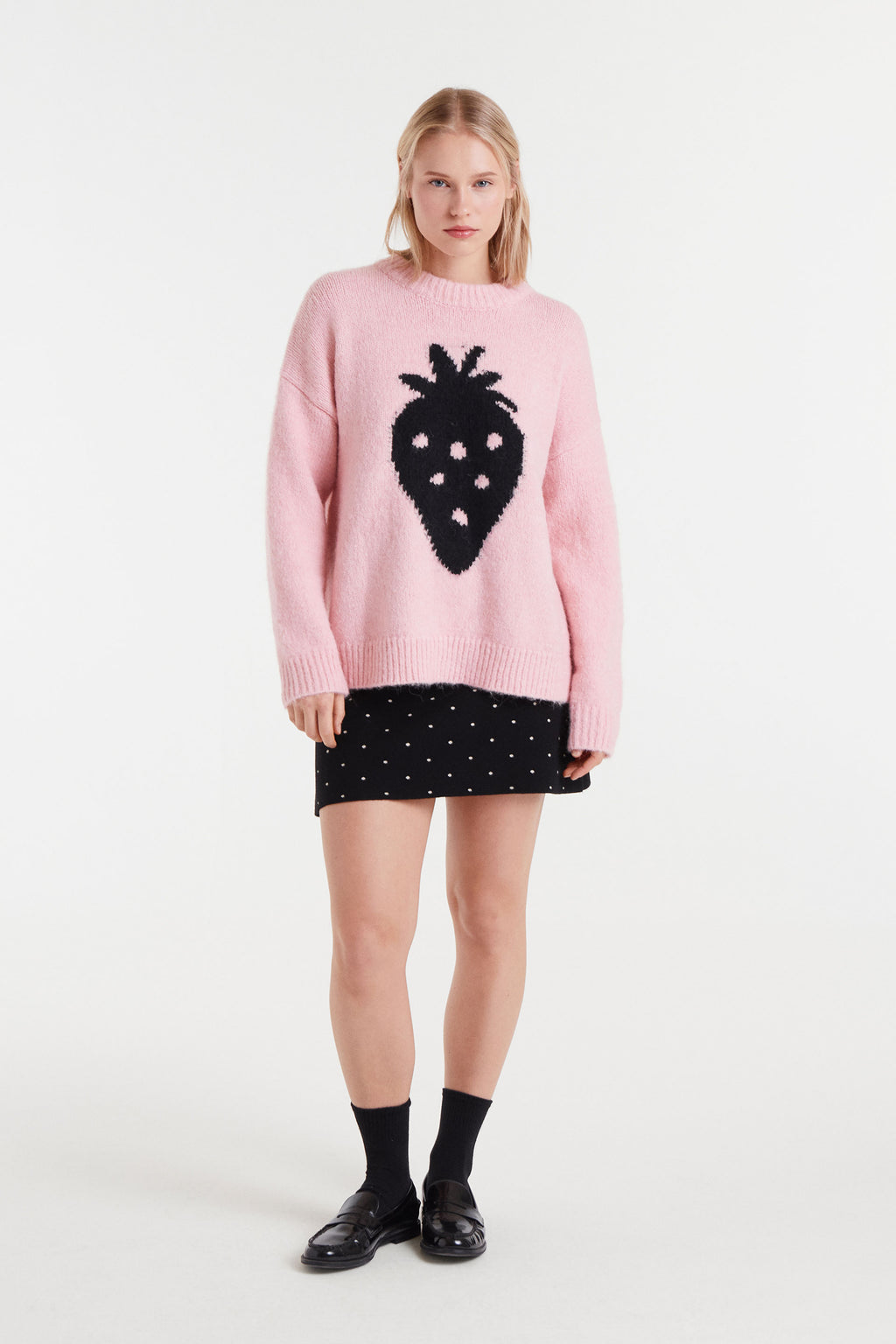 Pink Sweater with Black Strawbery Motif.