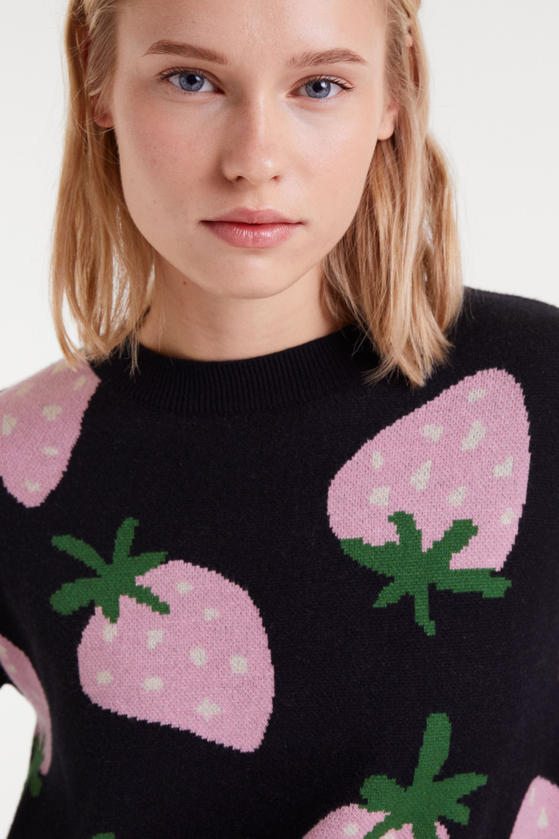 Black Jumper with Strawbery Print.