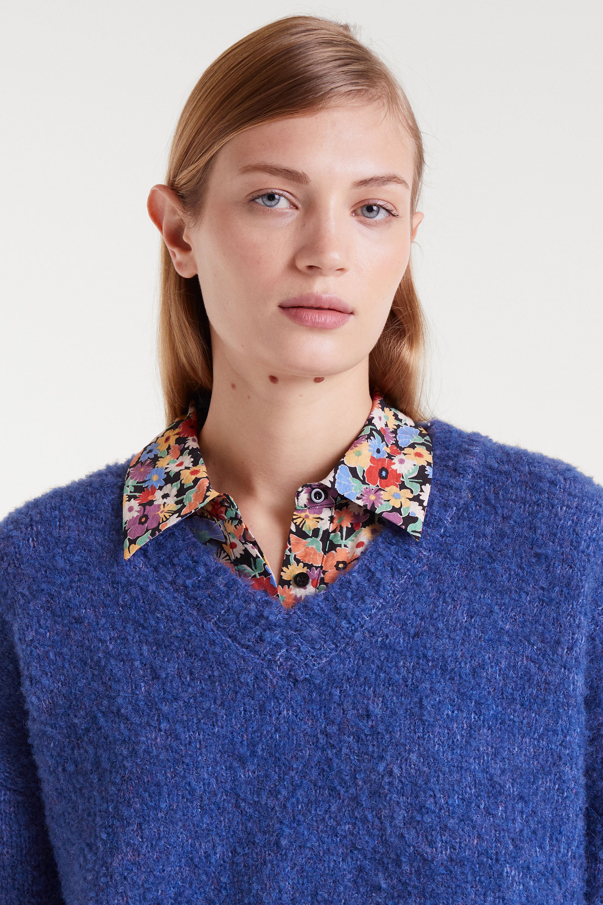Blue V-Neck Sewater.