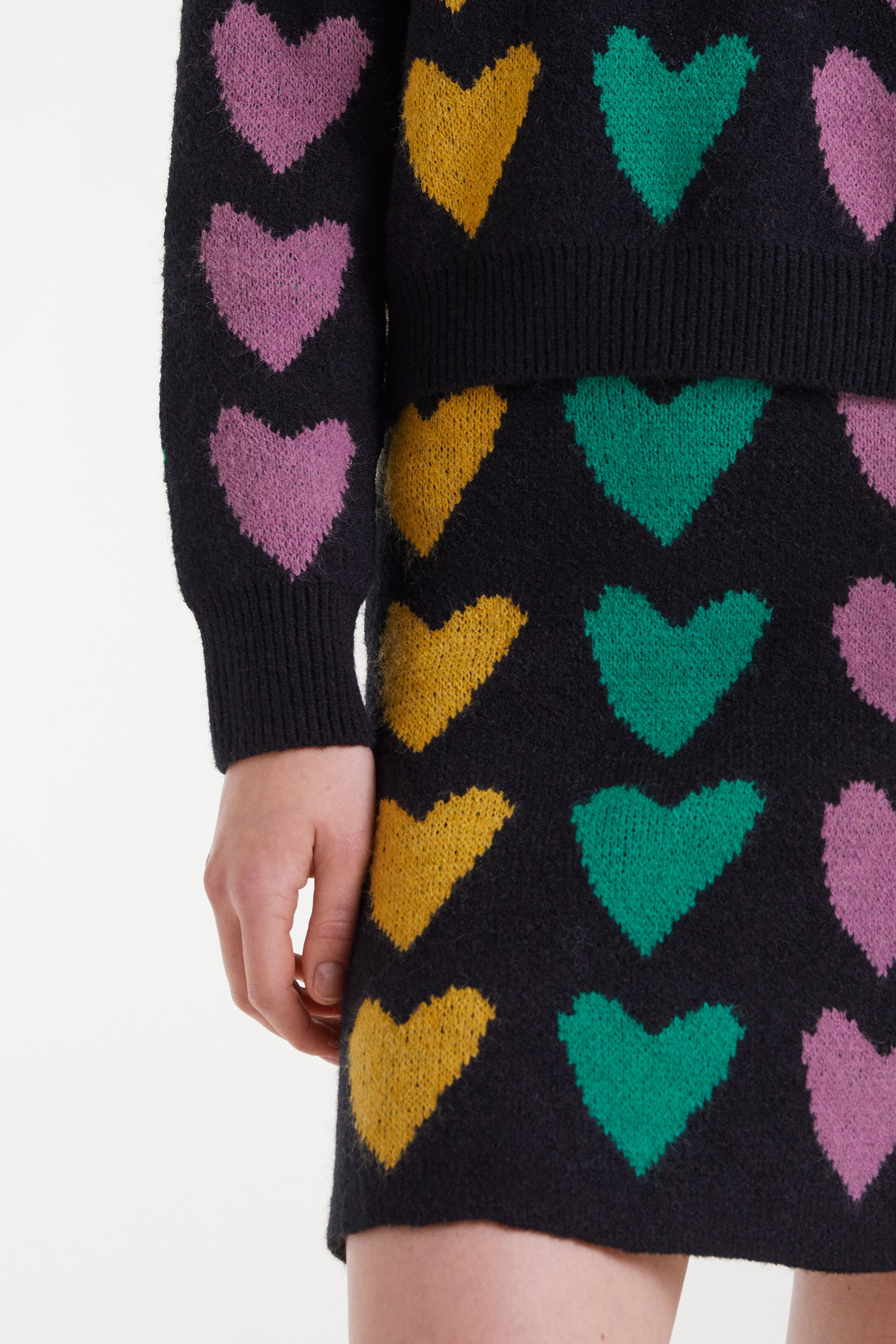 Black Mini Skirt with Heart Print.