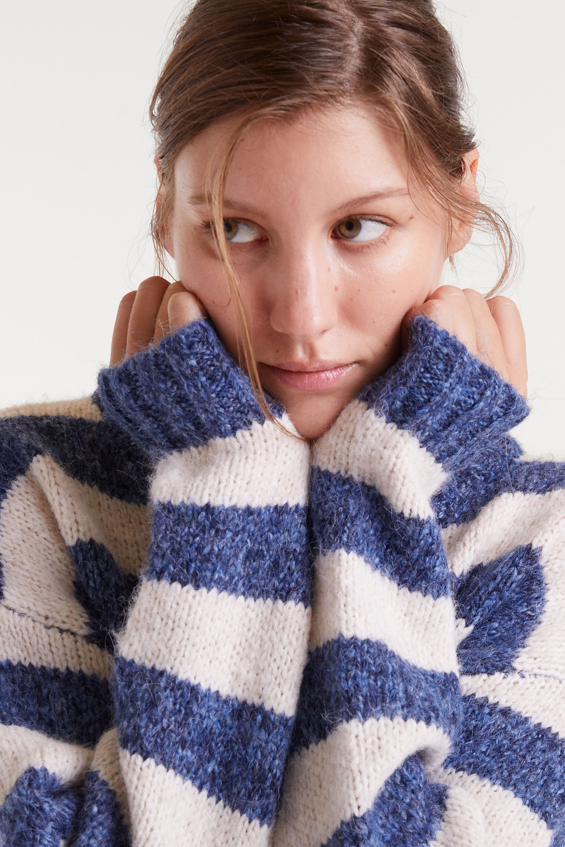 Blue and White Knitted Sweater.