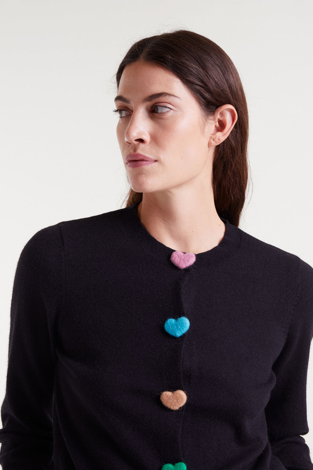 Black Knitted Cardigan with Heart-Shaped Buttons.