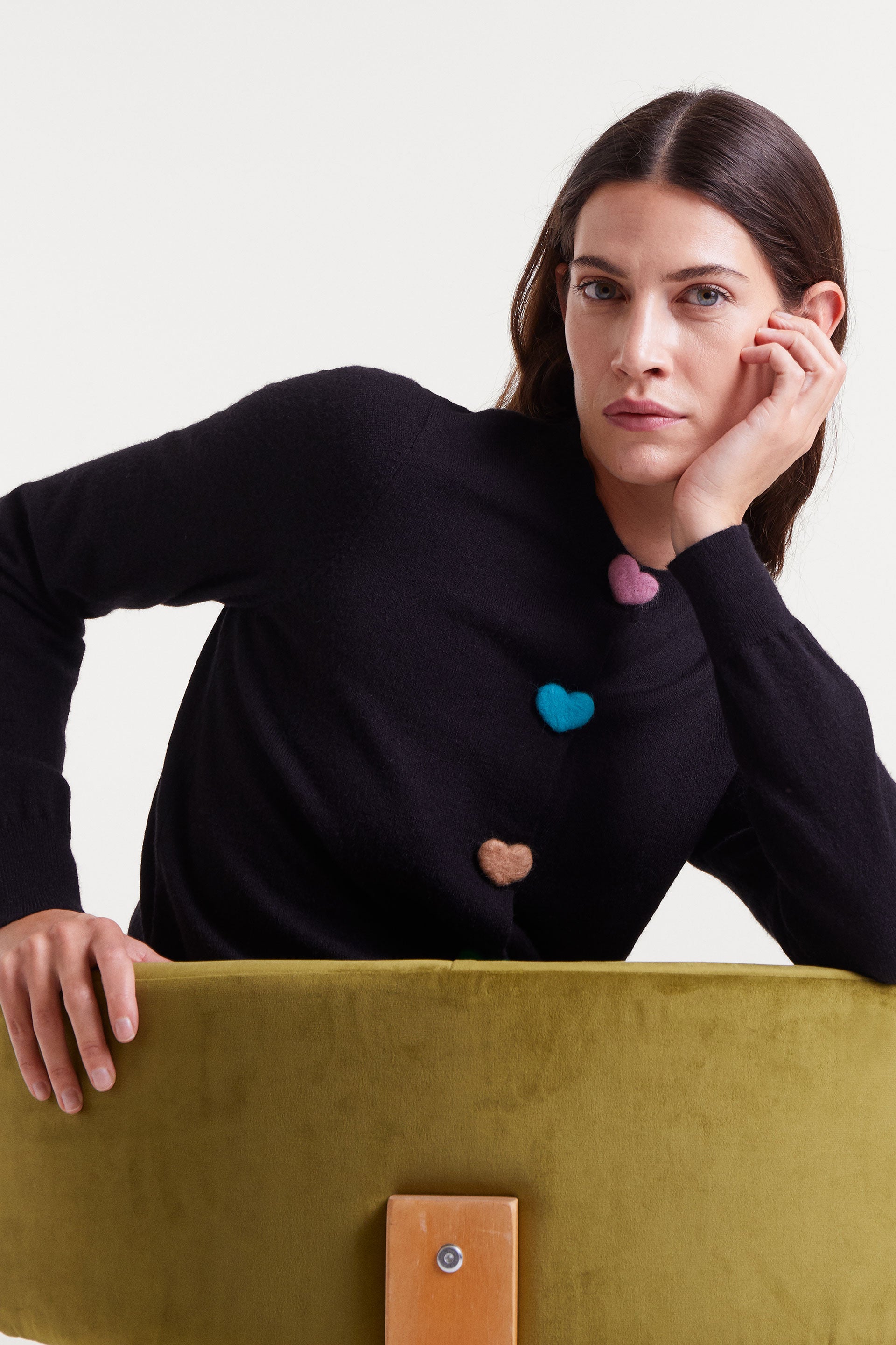 Black Knitted Cardigan with Heart-Shaped Buttons.