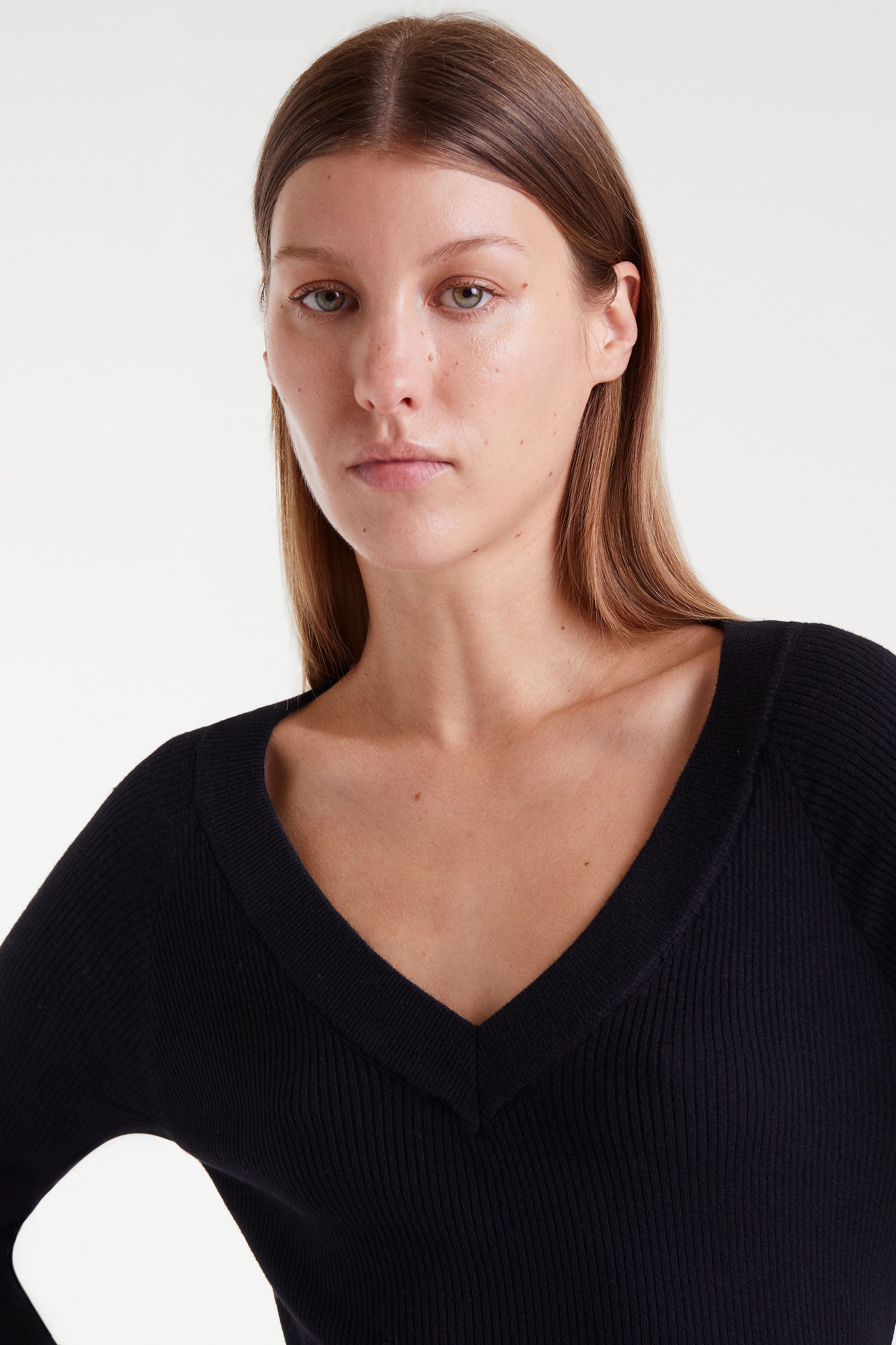 Black V-Neck Ribbed Sweater.