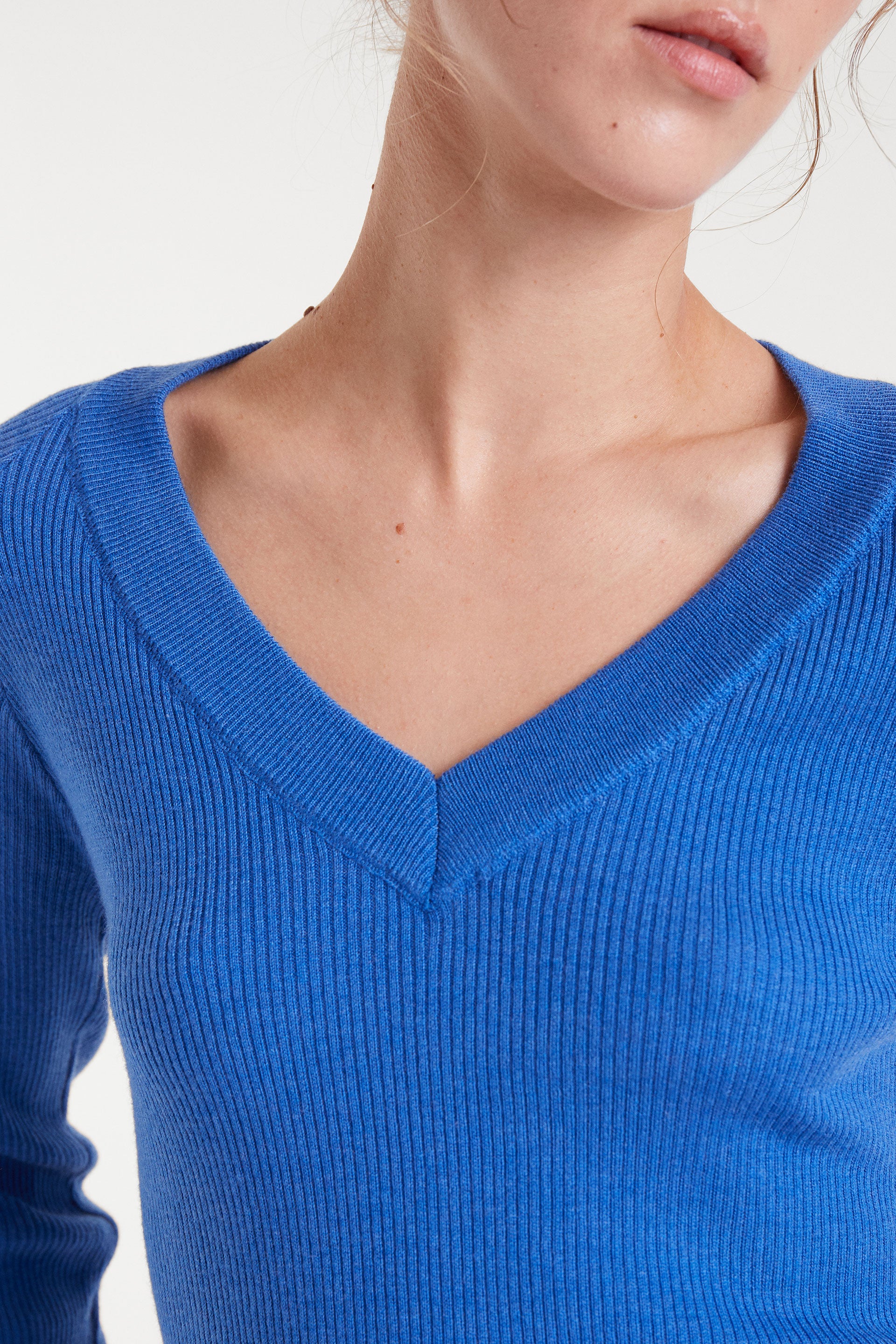 Blue V-Neck Ribbed Sweater.