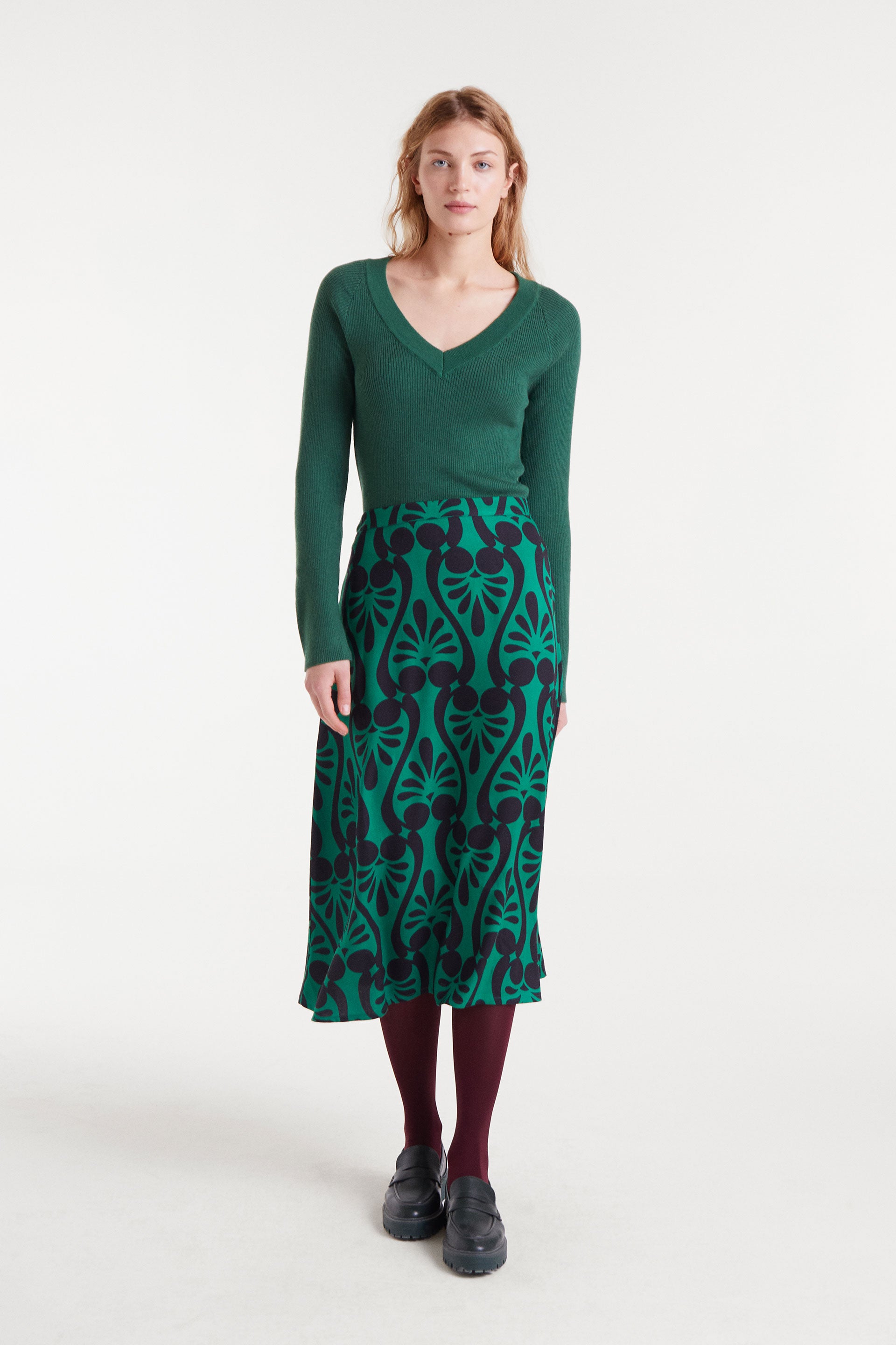 Green V-Neck Ribbed Sweater.