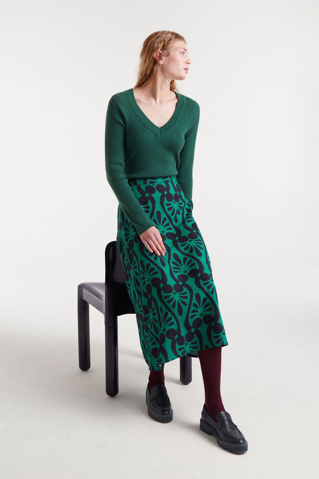 Green V-Neck Ribbed Sweater.