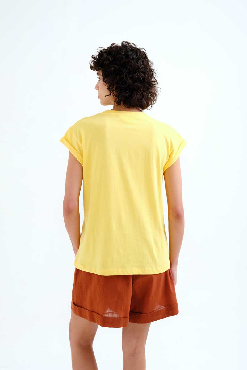 Yellow T-shirt with Orange Embroidery.