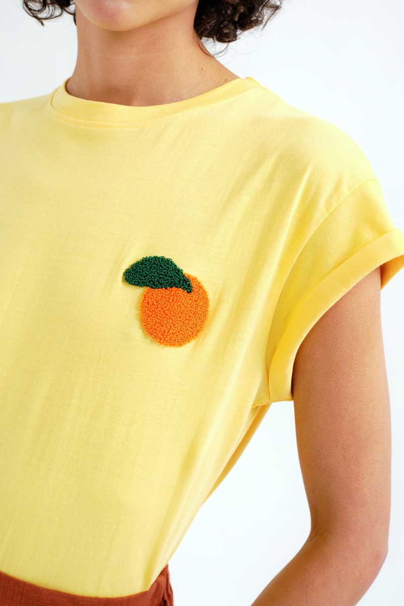 Yellow T-shirt with Orange Embroidery.