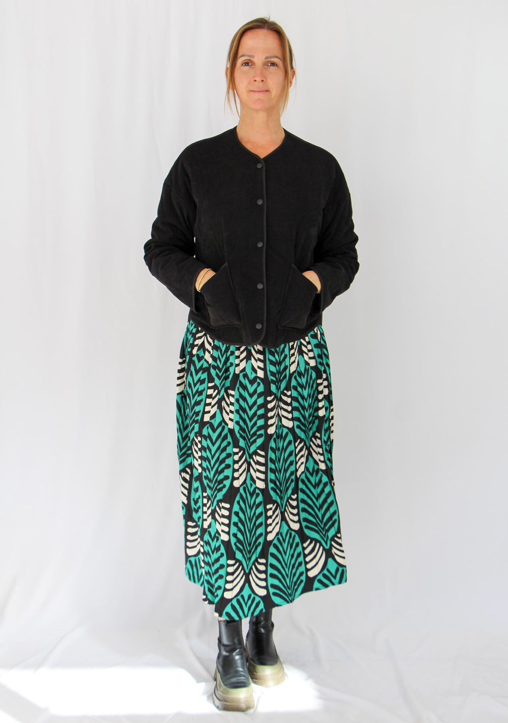 Pleated Flared Midi Skirt.