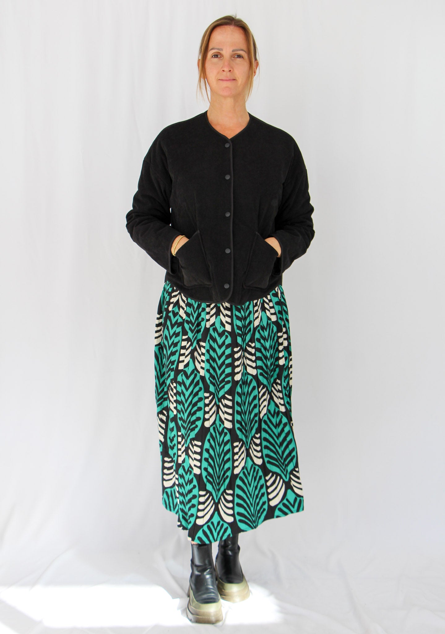 Pleated Flared Midi Skirt.